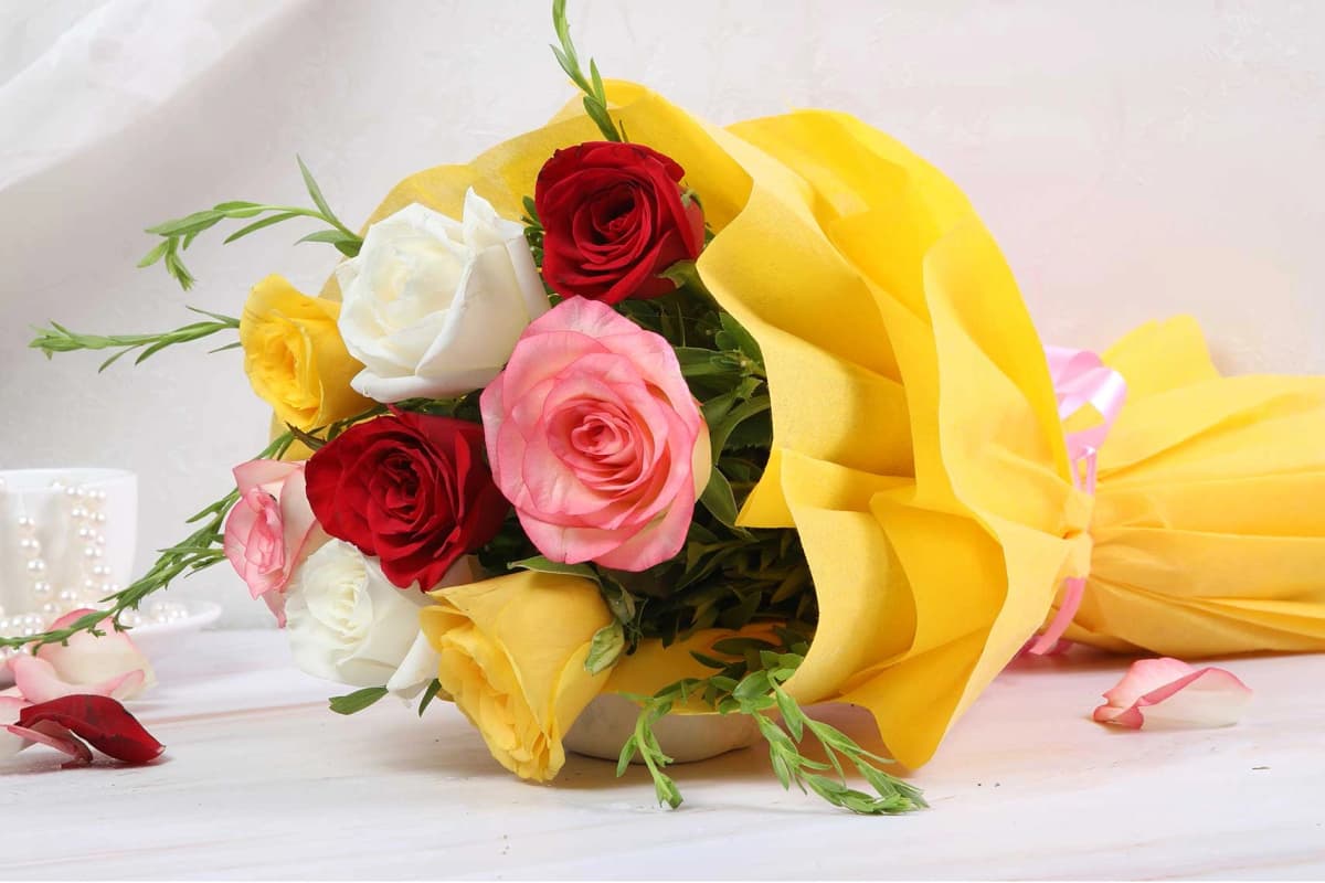Eight rose Flowers  bouquet with yellow wrapping — view 1 of 4